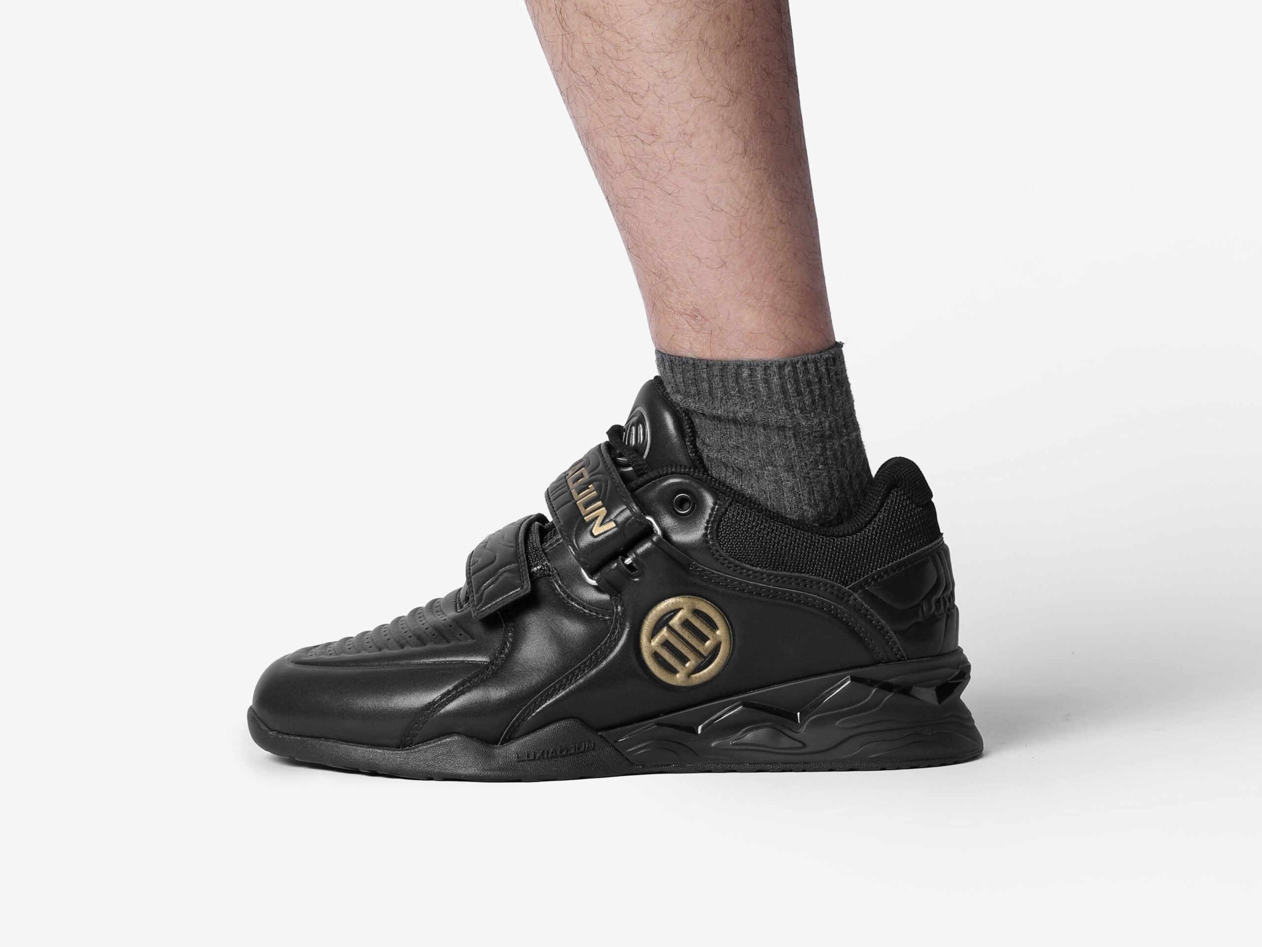 LUXIAOJUN PowerPro | Weightlifting Shoes (Black) Left side standing with logo