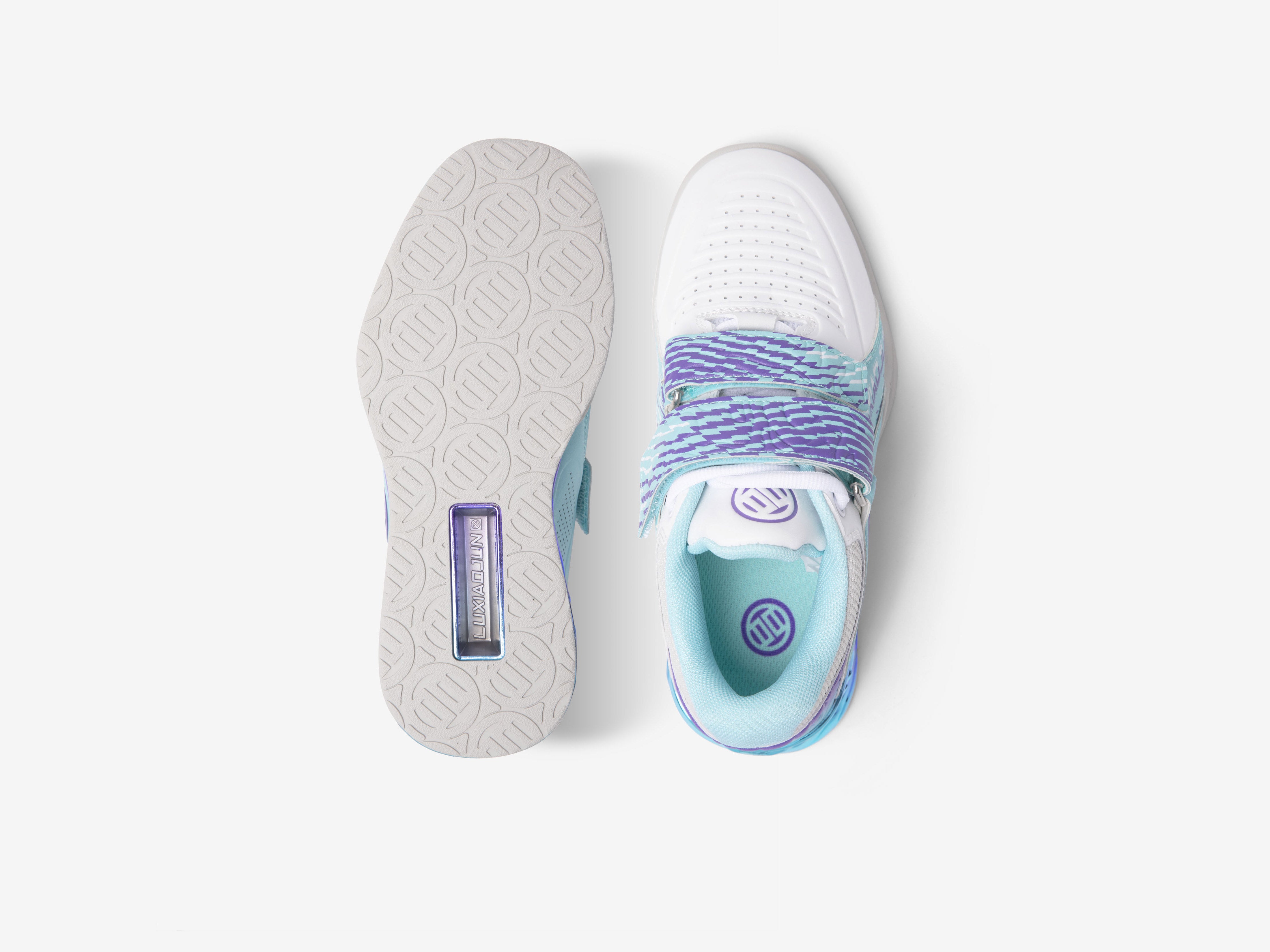 Light blue lifting shoes sneaker with purple accents on a white background