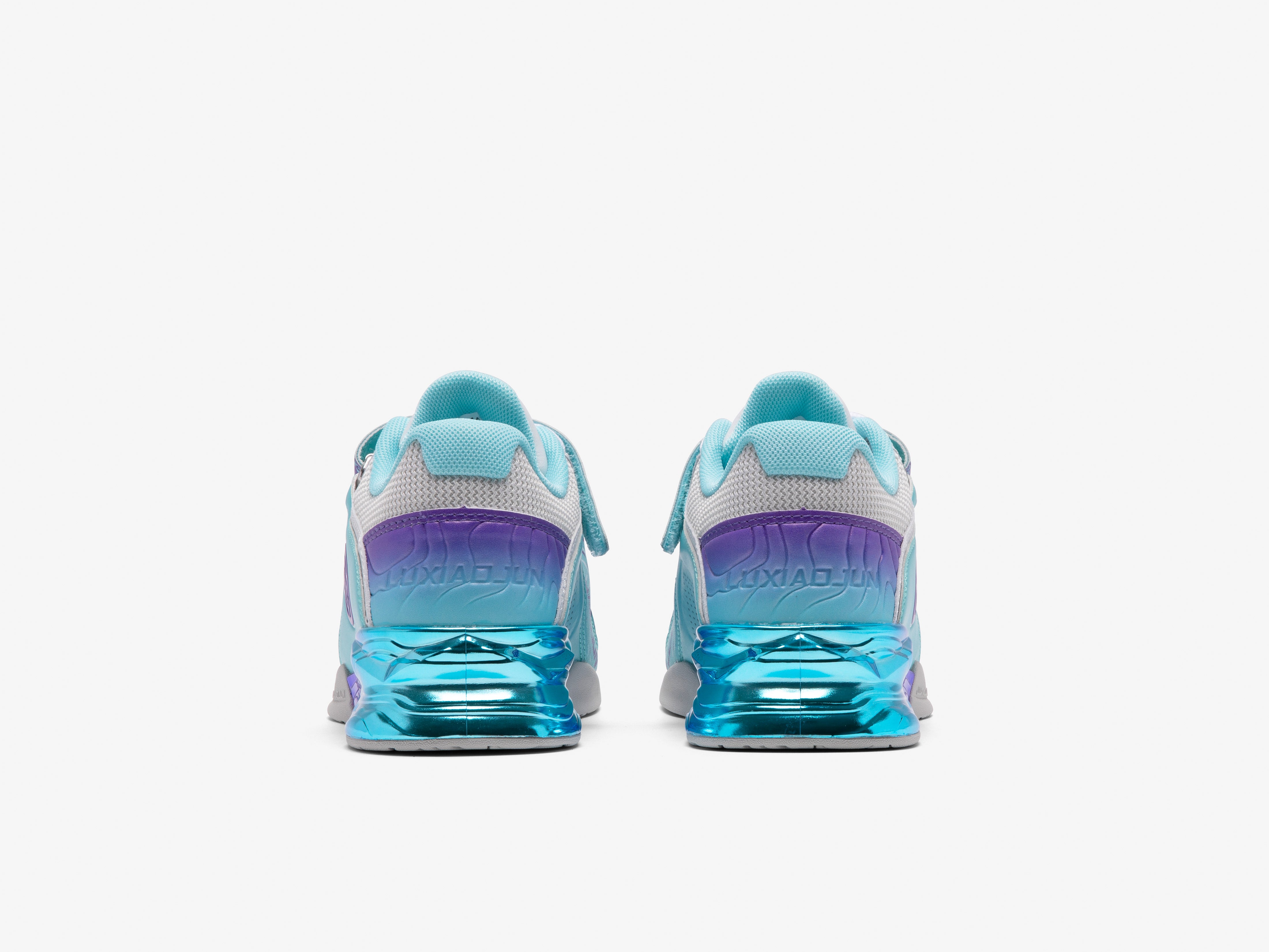 Pair of blue and purple gradient sneakers on a white background