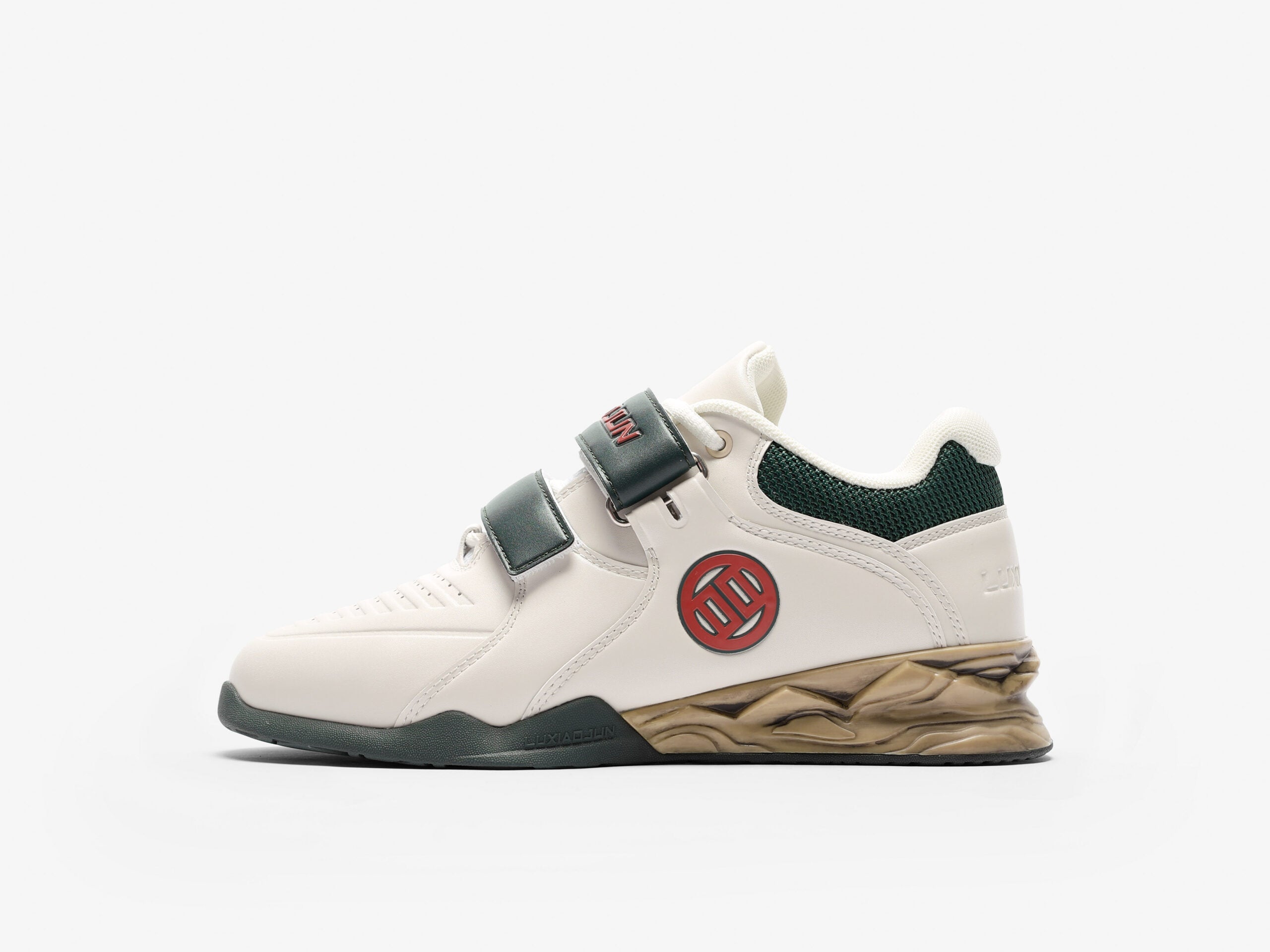 A pair of LUXIAOJUN PowerPro Weightlifting Shoes with a distressed white upper, green accents, and a unique sole design.