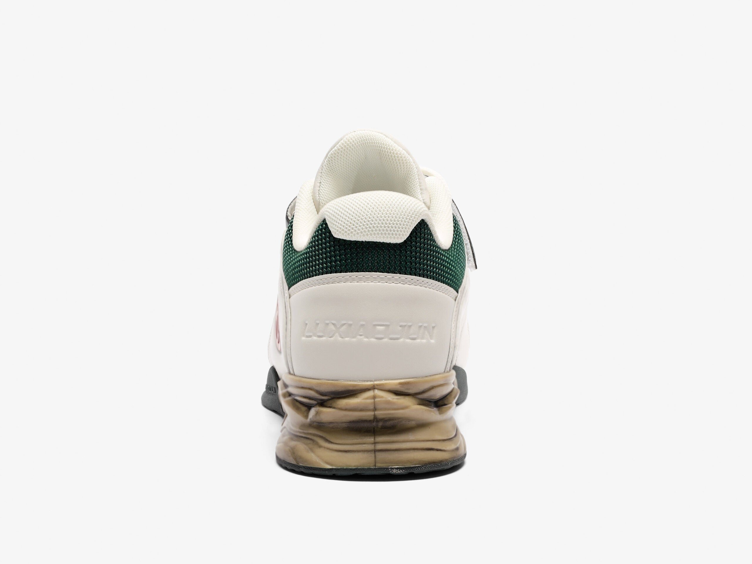 The rear view of the white and green weightlifting shoes showing the heel on a white background