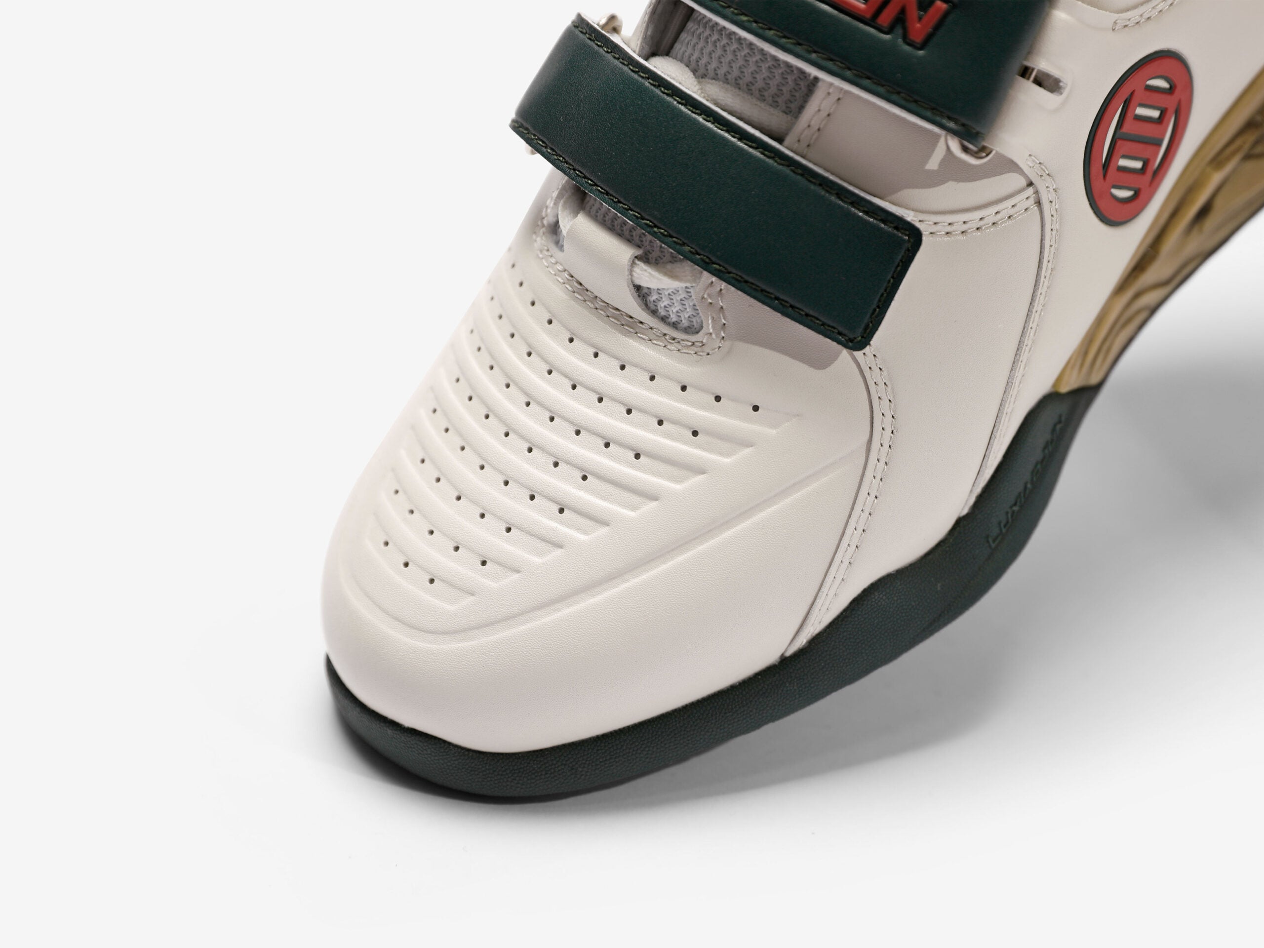 Close up toe box of LUXIAOJUN weightlifting shoes distressed color on a white background