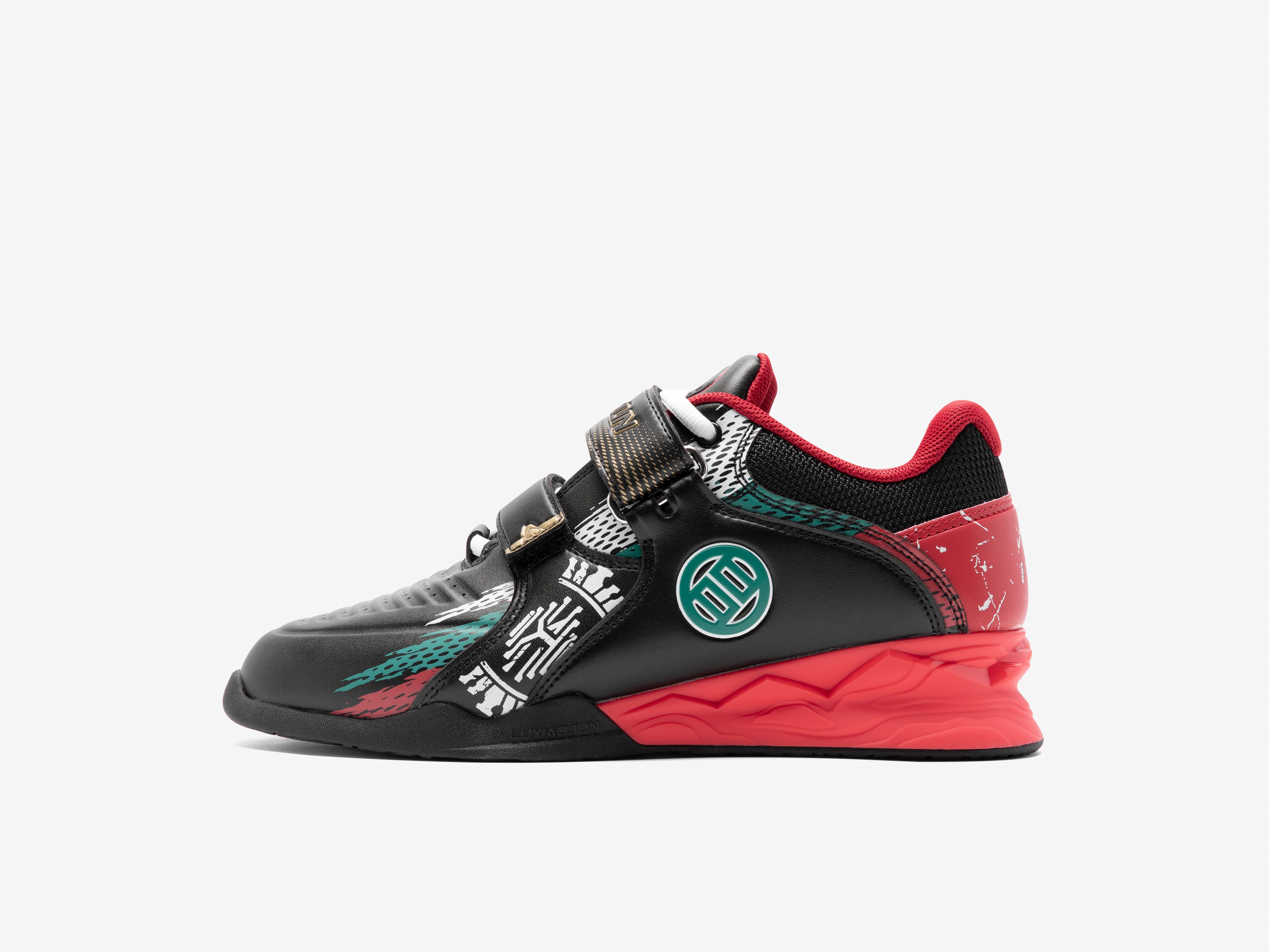 Black and red athletic shoe with Karlos Nasar unique design elements on a white background