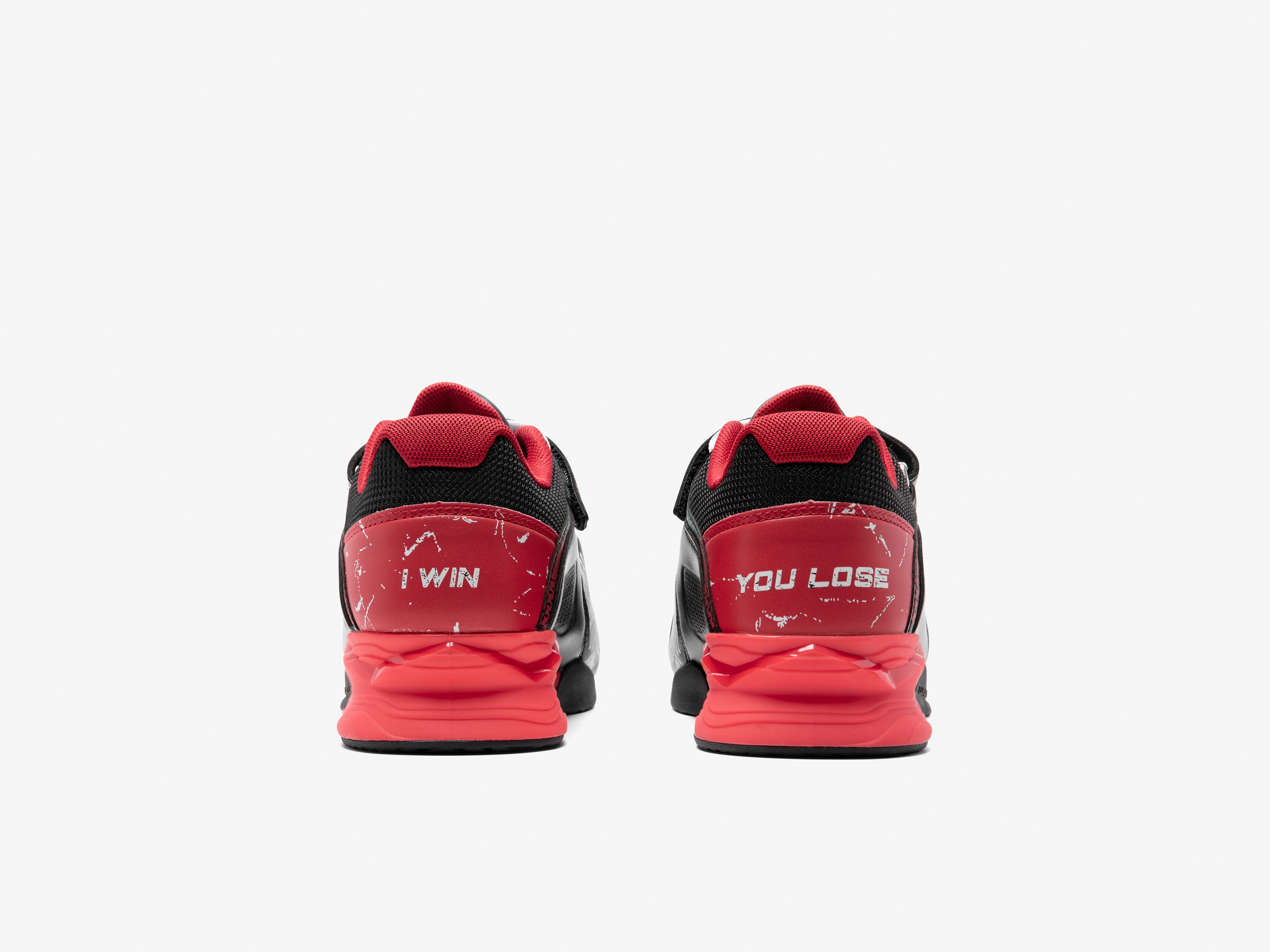 Red and black sneakers with 'I Win' and 'You Lose' text on a white background
