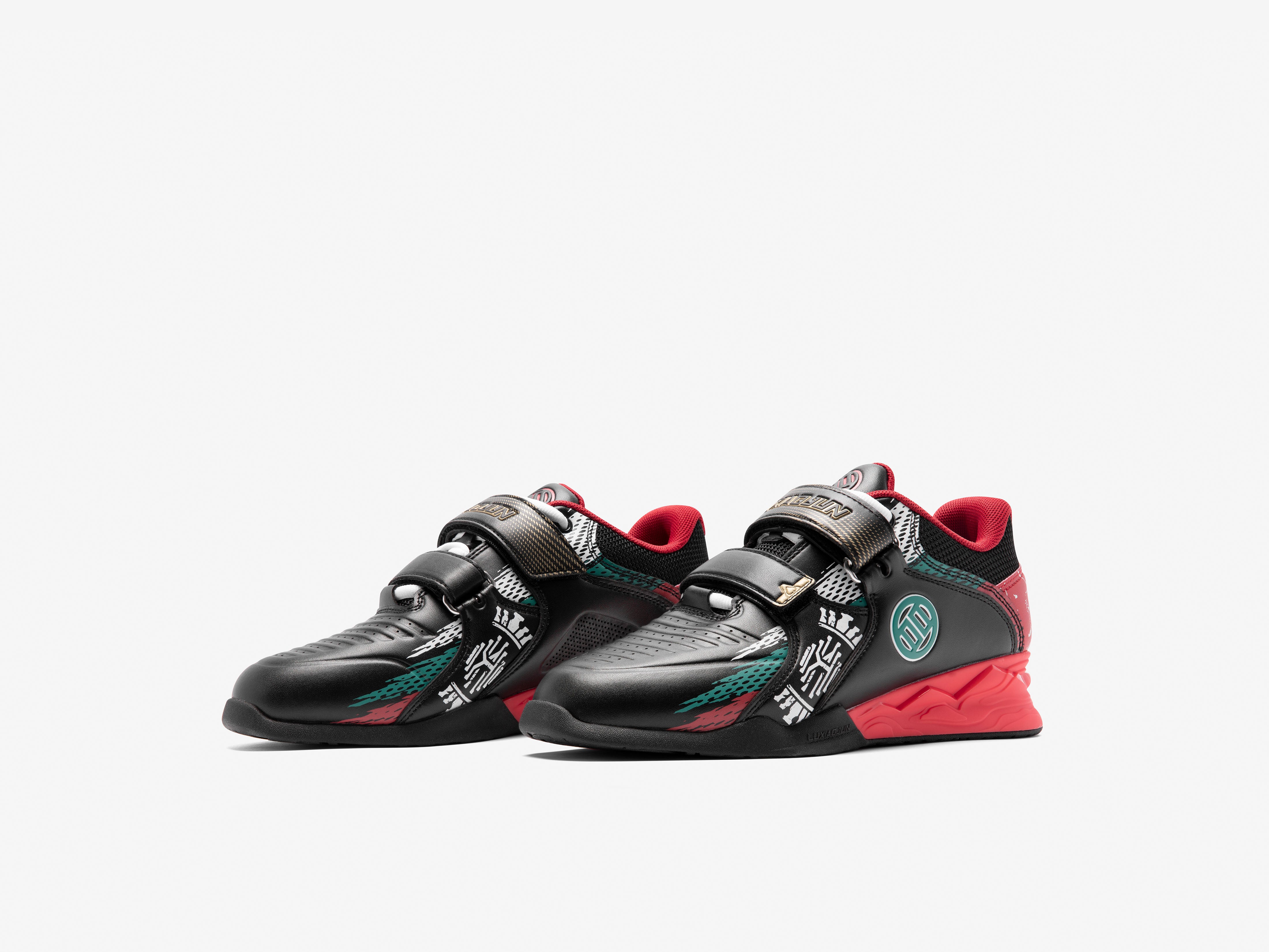 Pair of black and red Karlos Edition weightlifting shoes with unique design on a white background
