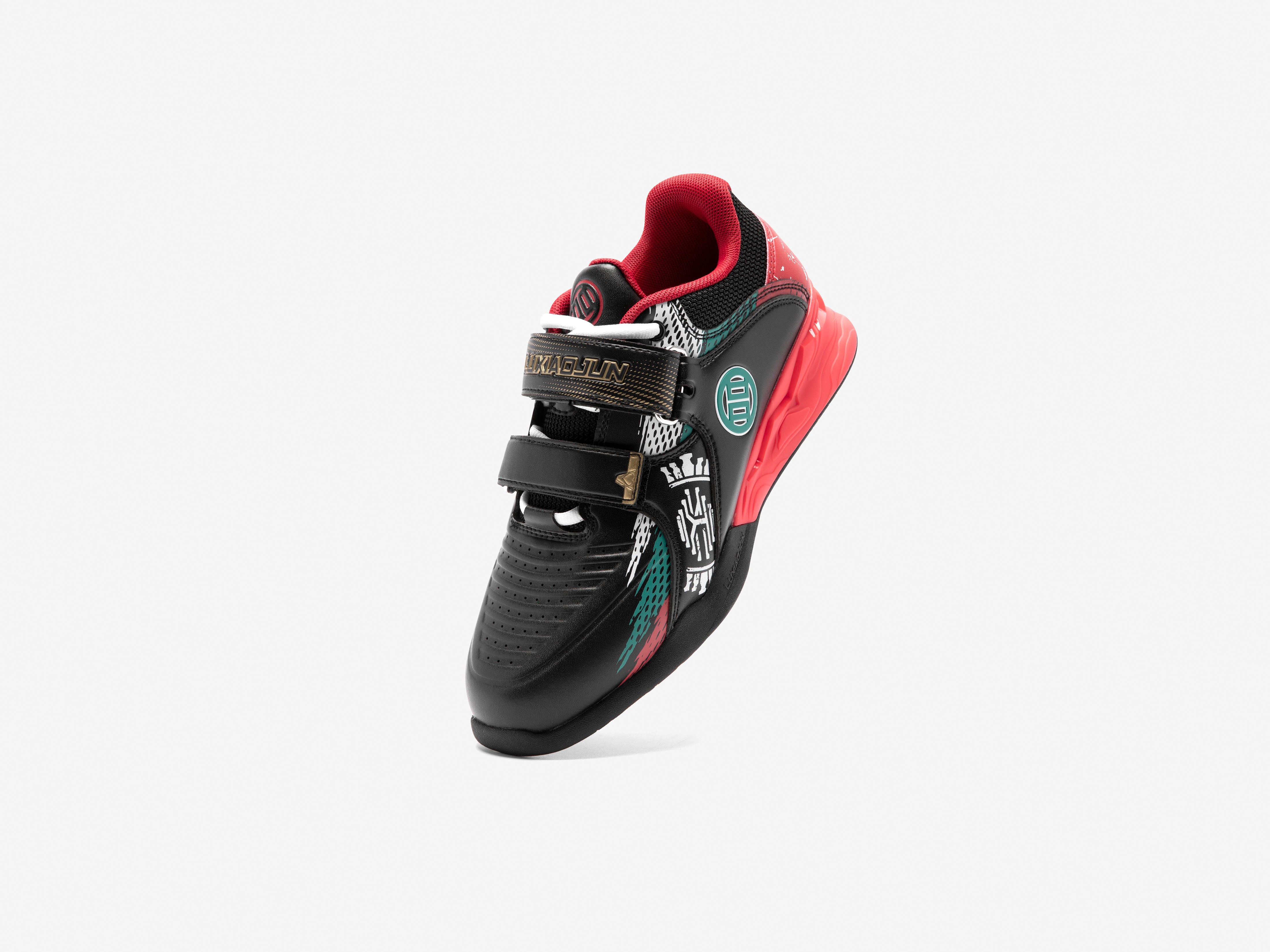 Black and red Karlos Edition weightlifting shoe standing on a white background