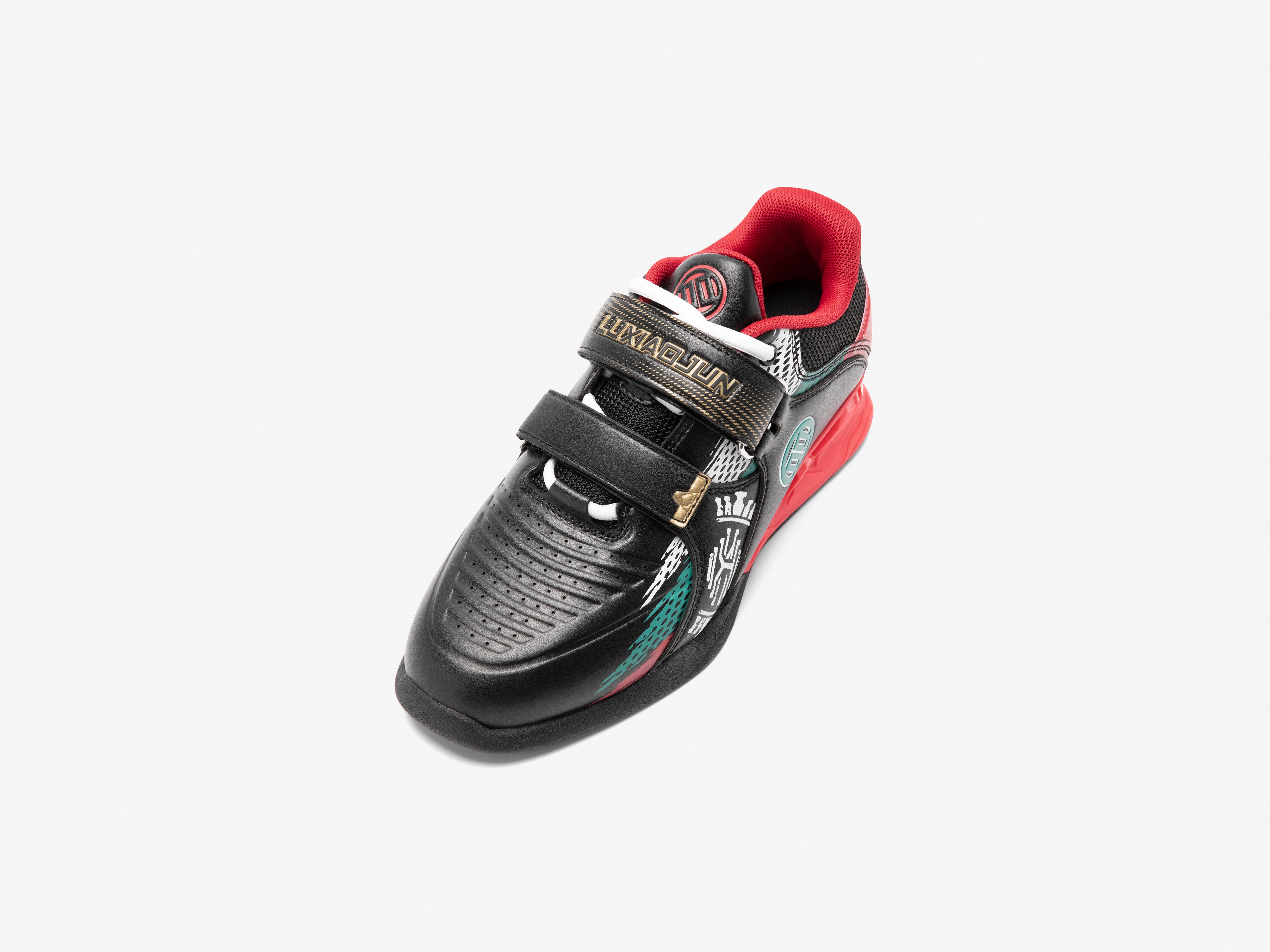 Black and red Karlos Edition weightlifting shoe with brand logo on a white background top view