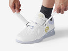 LUXIAOJUN PowerPro | Weightlifting Shoes (White) Model tightening the shoes