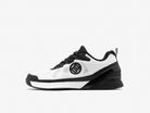 Black and white sneaker with a brand logo on a light gray background