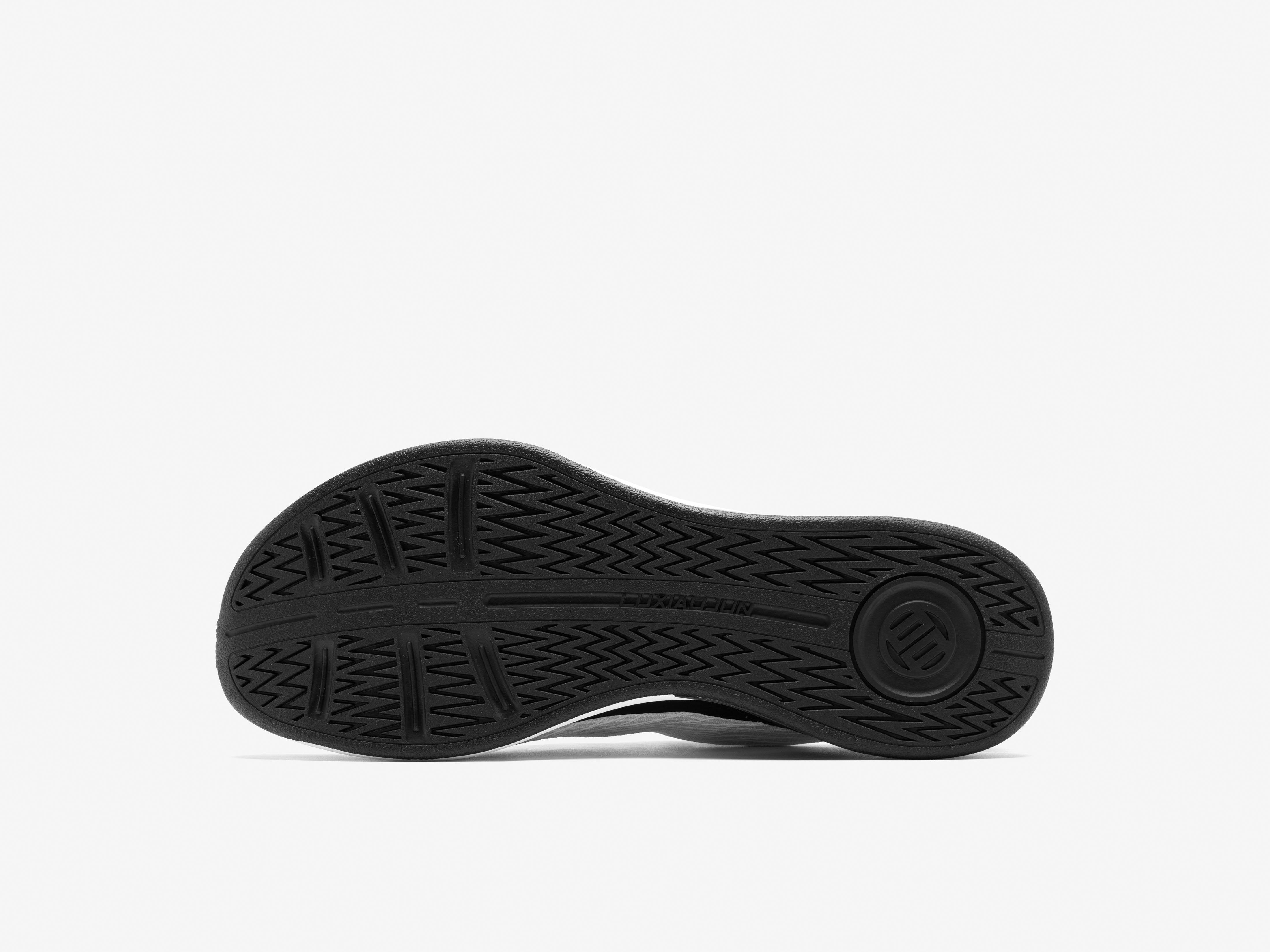 Black sneaker sole on a white background