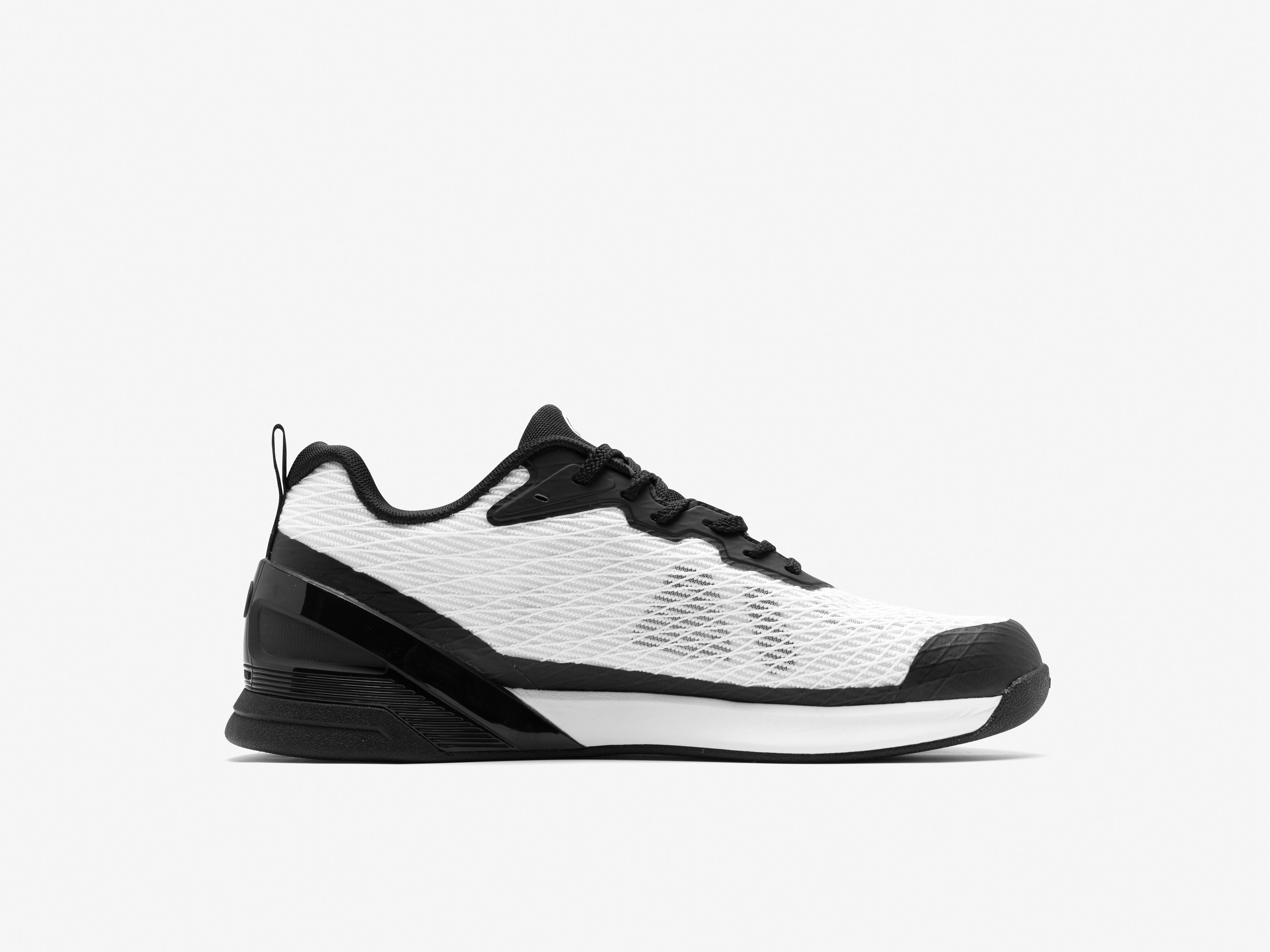 Black and white athletic shoe on a white background