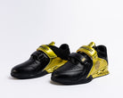Black and gold lifting shoes on a white background