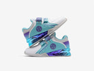 Pair of light blue and white athletic lifting squat sneakers with purple accents on a white background