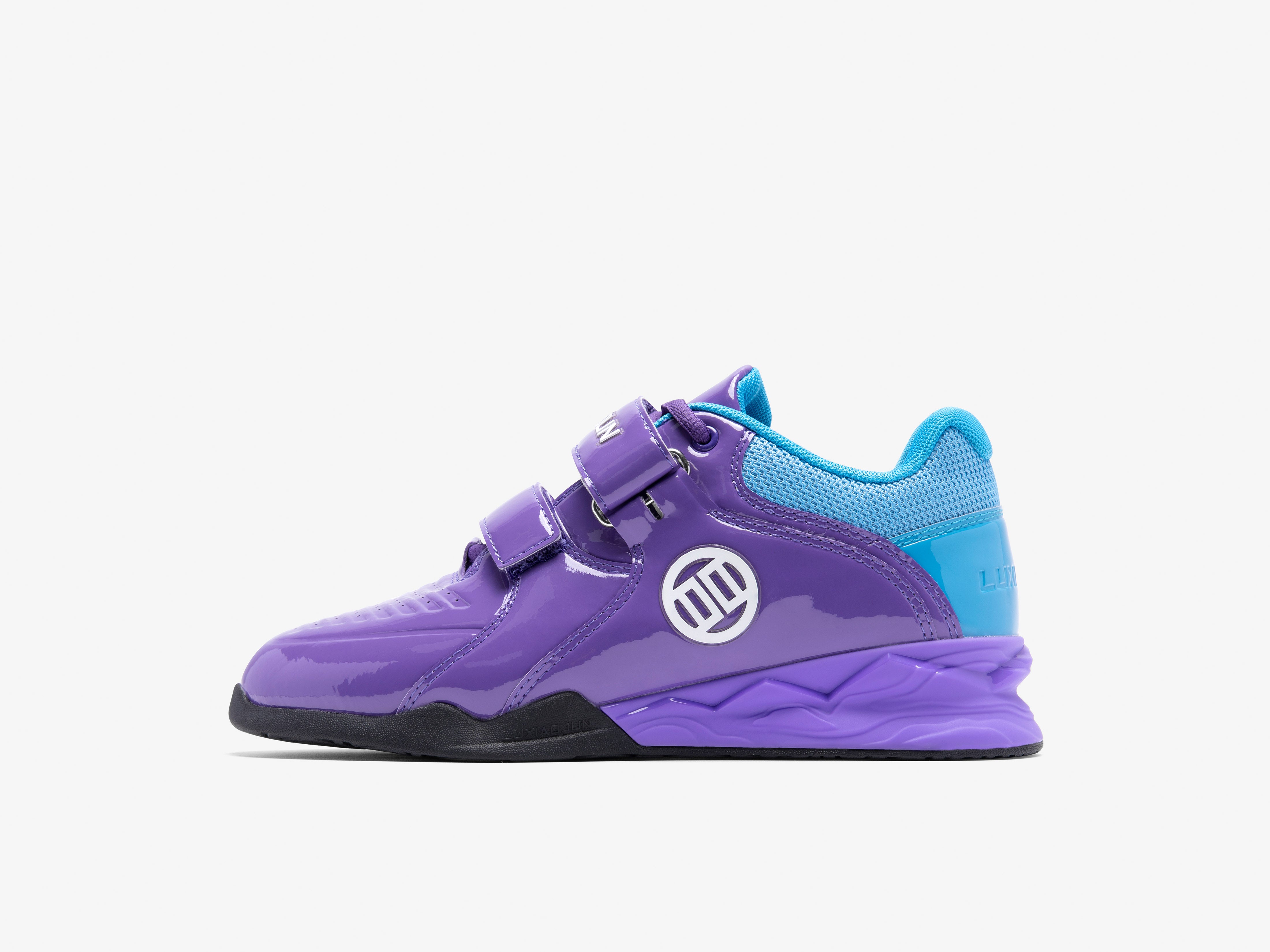 A pair of LUXIAOJUN PowerPro Weightlifting Shoes in purple color with blue accents.