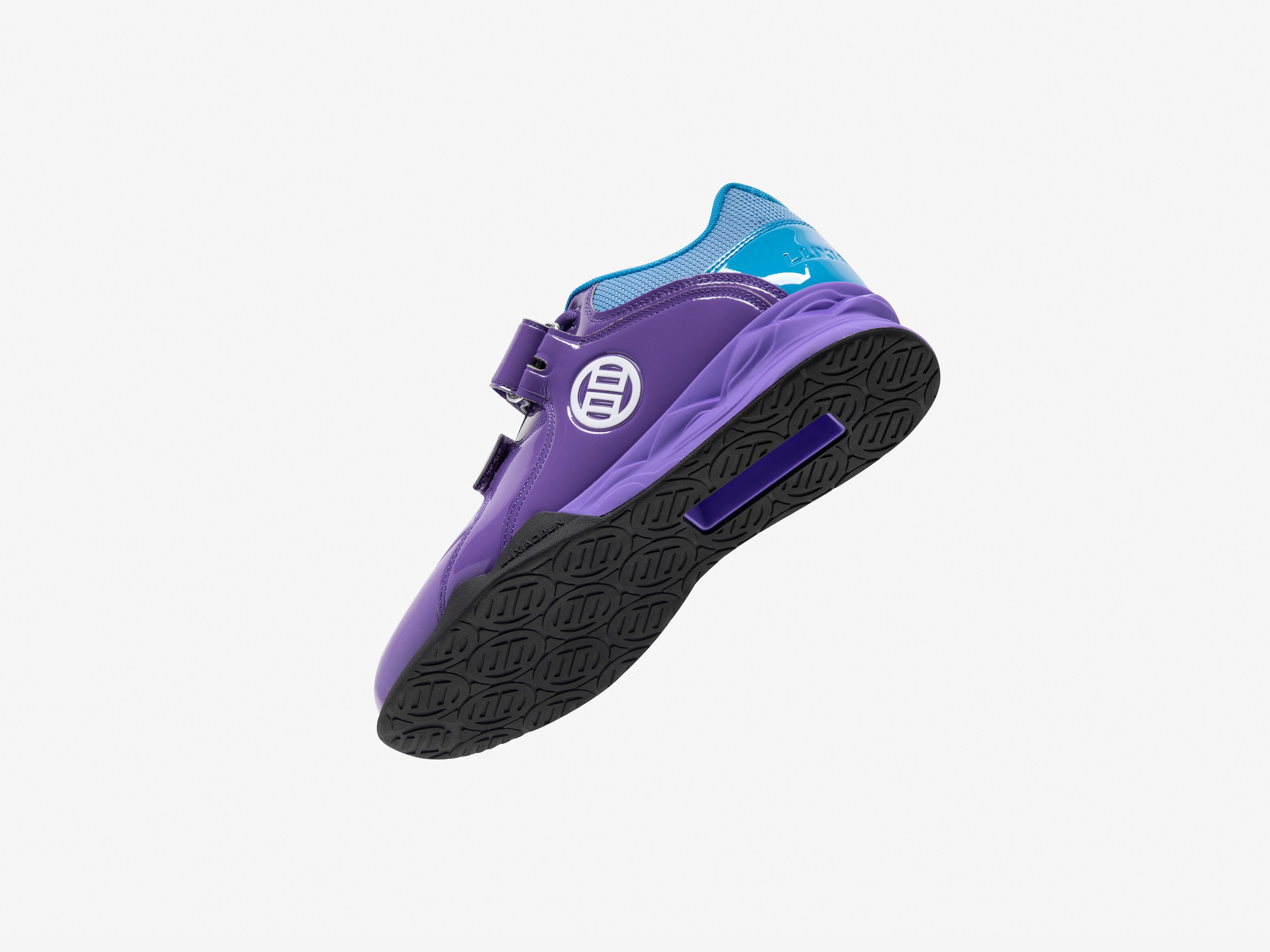 Purple lifting shoe with blue accents on a white background