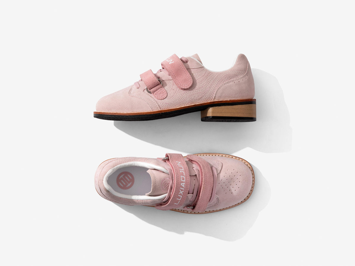 Pink Heritage Lifter from the side and from above, with the round LUXIAOJUN emblem on the insole