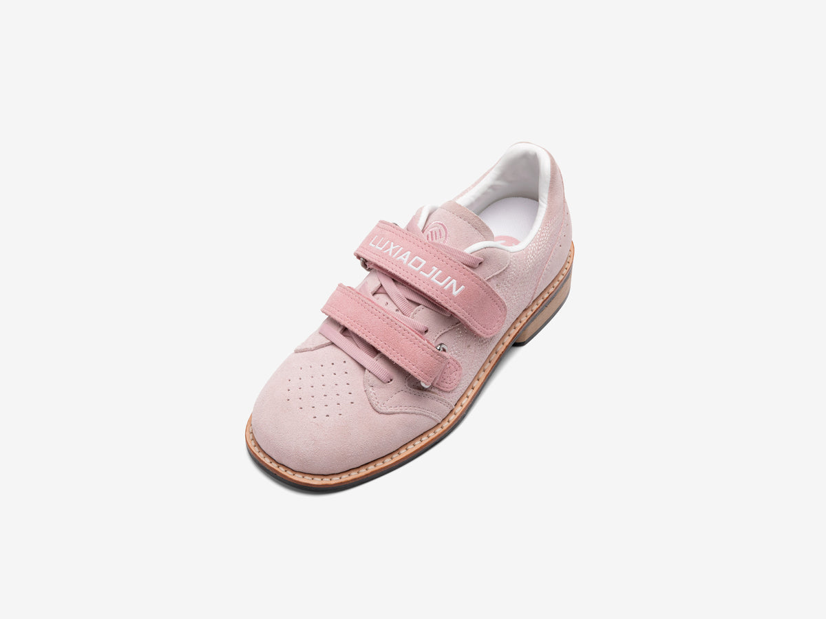 Top view of the pink Heritage Lifter showing the LUXIAOJUN strap, laces and perforated toe