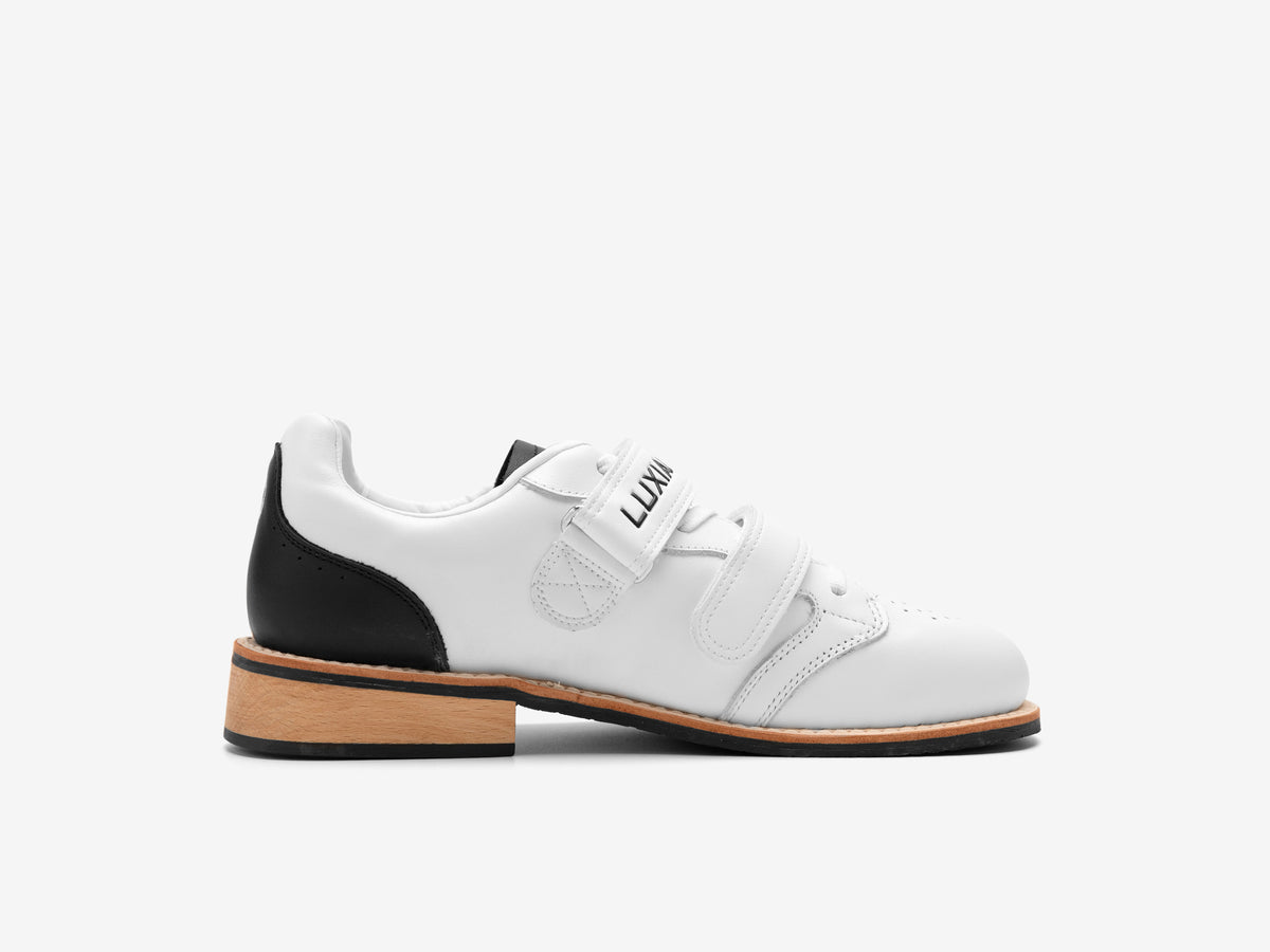 Other side of the white Heritage Lifter showing the LUXIAOJUN strap and black heel panel
